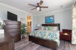 King Master Suite with TV and Balcony Access